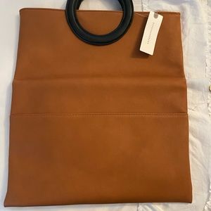 Anthropologie pocketbook/clutch with shoulder strap and dust bag